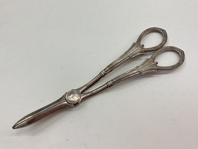 Lot 1068 - Pair of late Victorian silver grape scissors with engraved crest (Sheffield 1900)