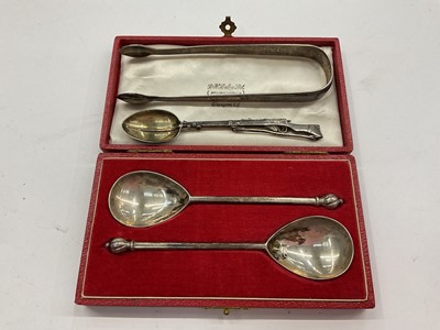 Lot 1070 - Pair of silver spoons in fitted case, pair of silver sugar tongs and a Chinese silver teaspoon in the form of a rifle