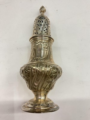 Lot 1076 - Victorian silver sugar caster of baluster form with embossed foliate scroll decoration and pierced cover on a pedestal base (Sheffield 1894), 21.5cm high