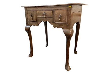 Lot 1275 - Georgian oak lowboy with three drawers, 77.5cm wide, 49.5cm deep, 75cm high