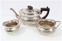 Lot 410 - Late Victorian Silverer three piece tea set -...