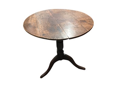 Lot 1276 - 19th century oak wine table with circular tilt top on turned column and splayed legs, 74cm diameter, 72cm high