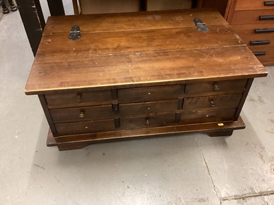 Lot 1293 - Hardwood coffee table/chest with hinged lid and nine drawers below, 90.5cm wide, 60.5cm deep, 40.5cm high