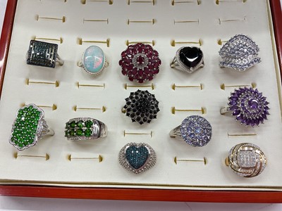 Lot 1111 - Group of 12 Gemporia silver and gem set rings in a fitted case with authenticity certificates