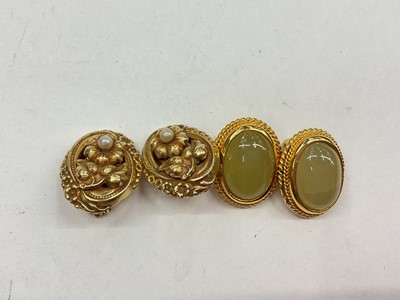 Lot 1134 - Pair 9ct gold floral clip on earrings and one other pair of costume earrings