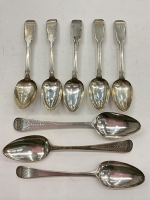 Lot 1137 - Eight Georgian silver table/serving spoons