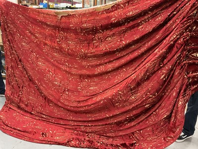 Lot 565 - Pair of red silk velvet devoré interlined curtains