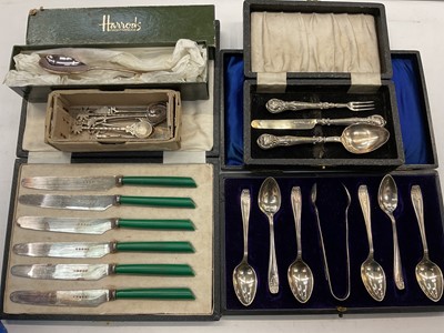 Lot 1126 - Set of six silver teaspoons and pair of matching silver sugar tongs (Sheffield 1930) in case, Victorian silver three piece christening cutlery set, together with other plated cased sets and flat...