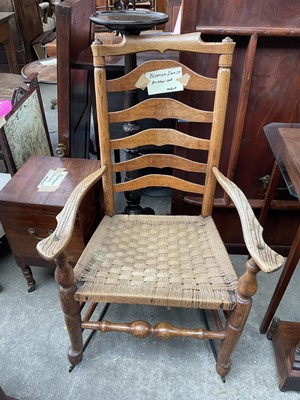 Lot 5350 - Antique elm ladder back rocking chair