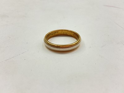 Lot 1143 - 18ct yellow and white gold wedding ring