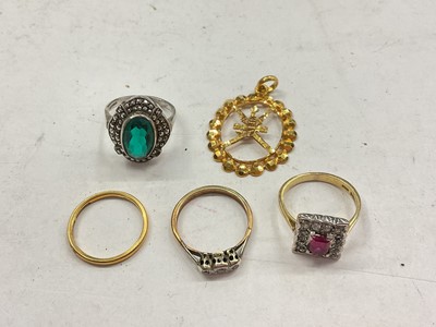 Lot 1144 - 22ct gold wedding ring, diamond three stone ring, 9ct gold cluster ring, silver marcasite ring and a yellow metal pendant (5)