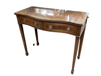 Lot 1319 - Georgian style mahogany serpentine fronted hall table with two drawers on square taper legs with spade feet, 100cm wide, 47cm deep, 86cm high