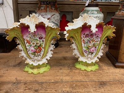 Lot 35 - Large pair of French porcelain vases with crenellated edges, in the style of Jacob Petit, painted with flowers, 30cm high