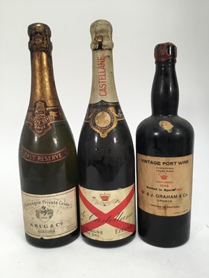 Lot 109 - Three bottles, Krug & Co brut reserve (low level), de Castellane champagne and a bottle of W & J Graham & Co. 1945 port, bottled 1947 (low level and leaking seal)
