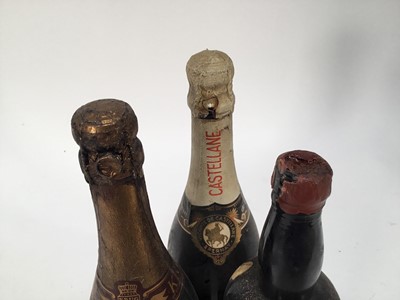 Lot 109 - Three bottles, Krug & Co brut reserve (low level), de Castellane champagne and a bottle of W & J Graham & Co. 1945 port, bottled 1947 (low level and leaking seal)