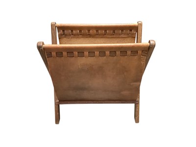 Lot 1359 - Oak and leather magazine rack