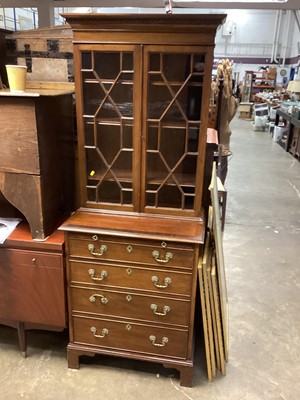 Lot 1361 - George III style mahogany two height bookcase with astragal glazed doors above, brushing slide and four drawers below, 72cm wide, 46cm deep, 179cm high