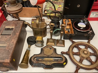 Lot 316 - Group of metal wares including a pair of brass candlesticks, lantern, watering can, oil lamp, another desk lamp, portable record plater, novelty ship's wheel and other items