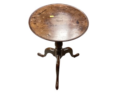 Lot 1388 - George III mahogany wine table with circular tilt top on turned column and three splayed legs, 37cm diameter