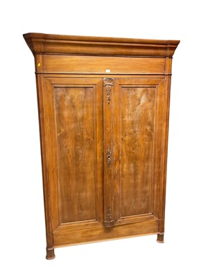 Lot 1401 - Late 18th/early 19th century chestnut armoire enclosed by two panelled doors, 136cm wide, 55cm deep, 214cm high