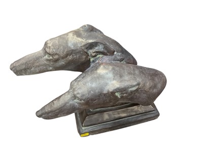 Lot 477 - Bronzed terracotta sculpture in the form of two greyhound heads, 47cm long