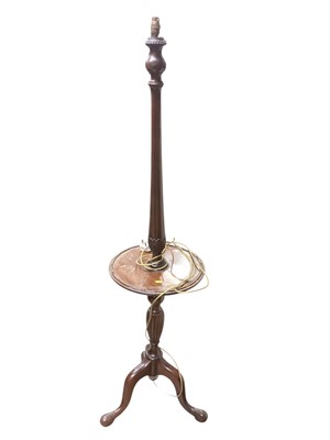 Lot 1410 - Mahogany standard lamp on three hipped splayed legs