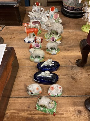 Lot 59 - Group of Staffordshire and Derby animal figures, including an unusual pair of poodle boxes, a pair of sheep spill vases, sponge ware cat, pair of Derby sheep, etc