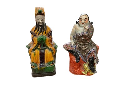 Lot 17 - Chinese porcelain figure of an immortal, and a Chinese Sancai pottery figure (2)