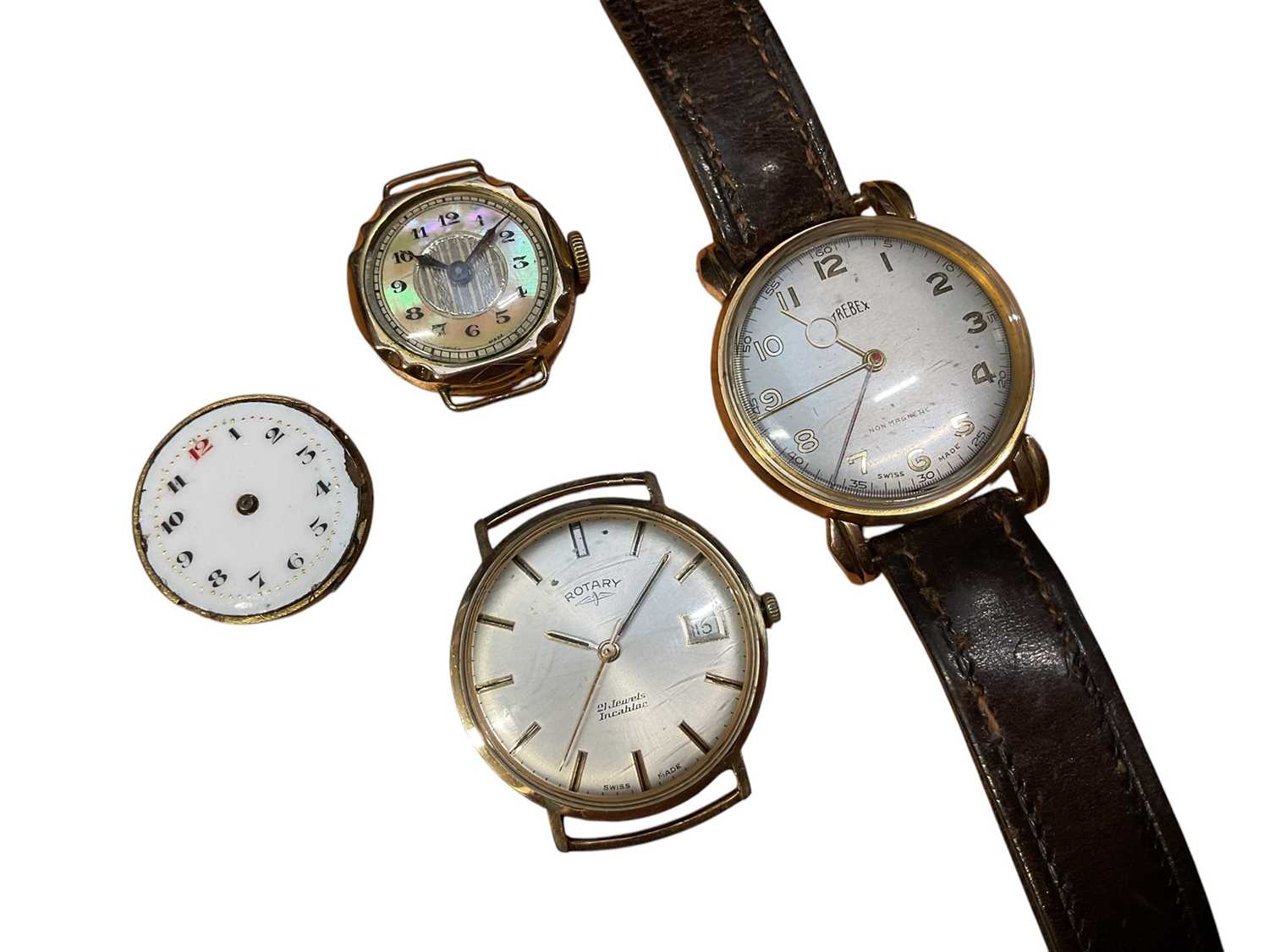 Lot 31 - 1940s Trebex gold cased wristwatch with fancy lugs on brown leather strap, 1970s Rotary gold cased calendar wristwatch, vintage gold plated watch