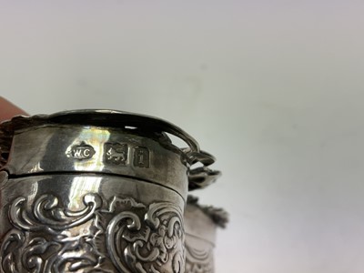 Lot 317 - Two Edwardian silver pot pourri pots