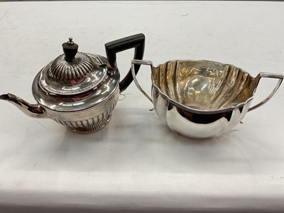 Lot 1167 - Late Victorian silver bachelors teapot by Mappin & Webb, together with a Georgian style silver sugar basin (2)