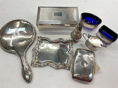 Lot 1169 - Group of silver items to include a 1930s cigarette box, Edwardian silver cigarette case, silver mirror and a silver condiment set