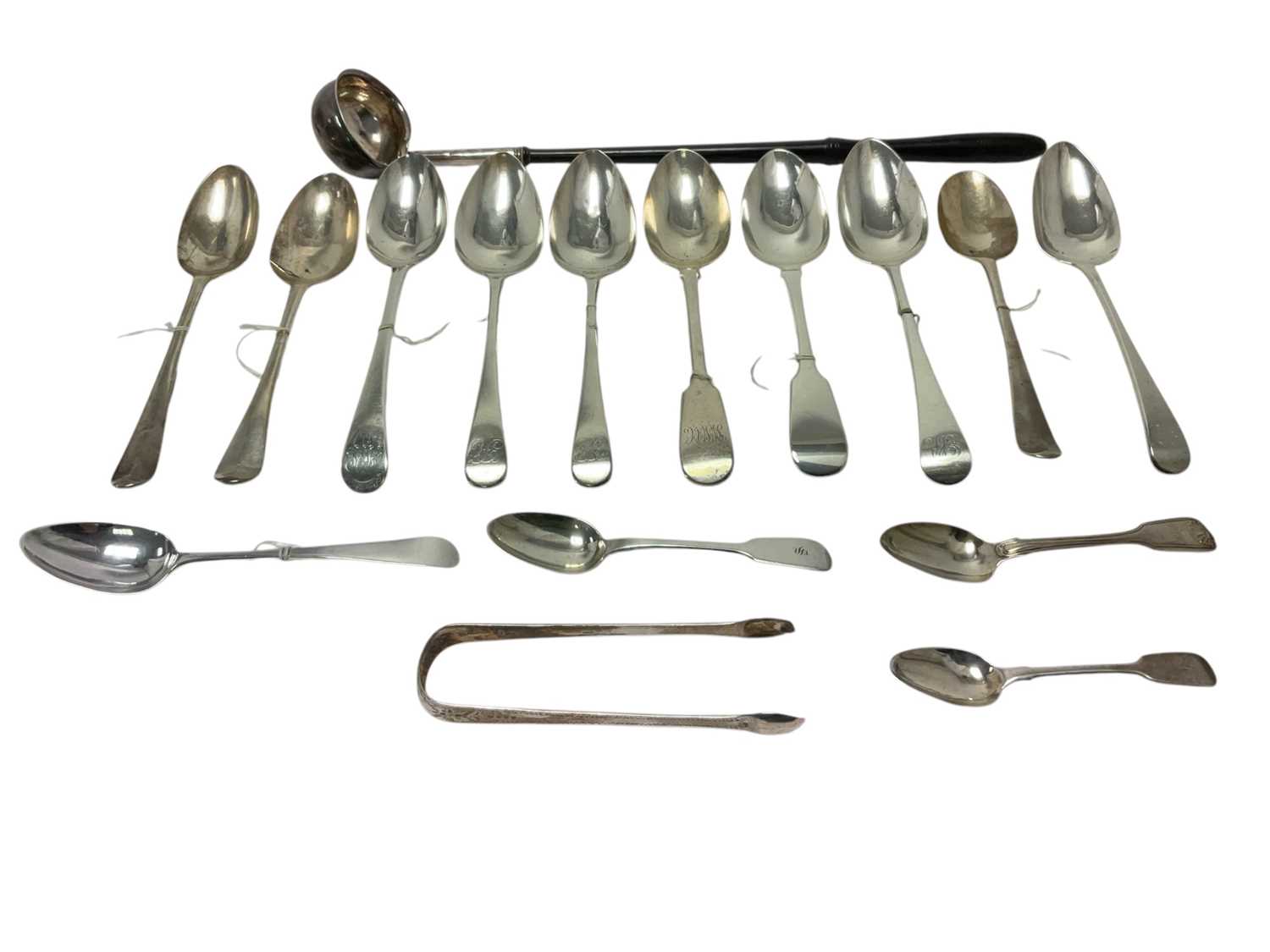 Lot 326 - Group of ten Georgian silver table spoons, George III silver toddy ladle and other items