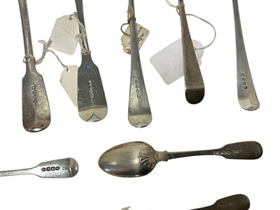 Lot 326 - Group of ten Georgian silver table spoons, George III silver toddy ladle and other items