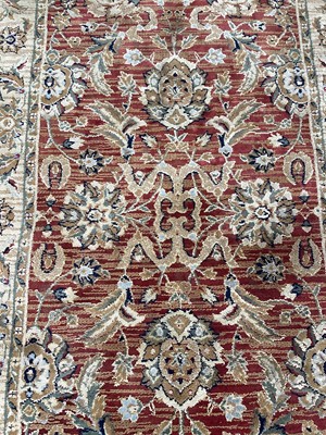 Lot 1436 - Small Turkish rug with floral decoration on red and beige ground, 167cm x 96cm