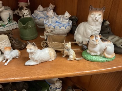 Lot 129 - Good collection of mostly 19th century ceramic cats, including fairings, continental examples, etc, together with some miniature mice and dogs