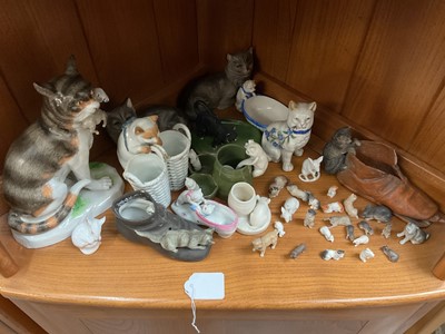 Lot 129 - Good collection of mostly 19th century ceramic cats, including fairings, continental examples, etc, together with some miniature mice and dogs