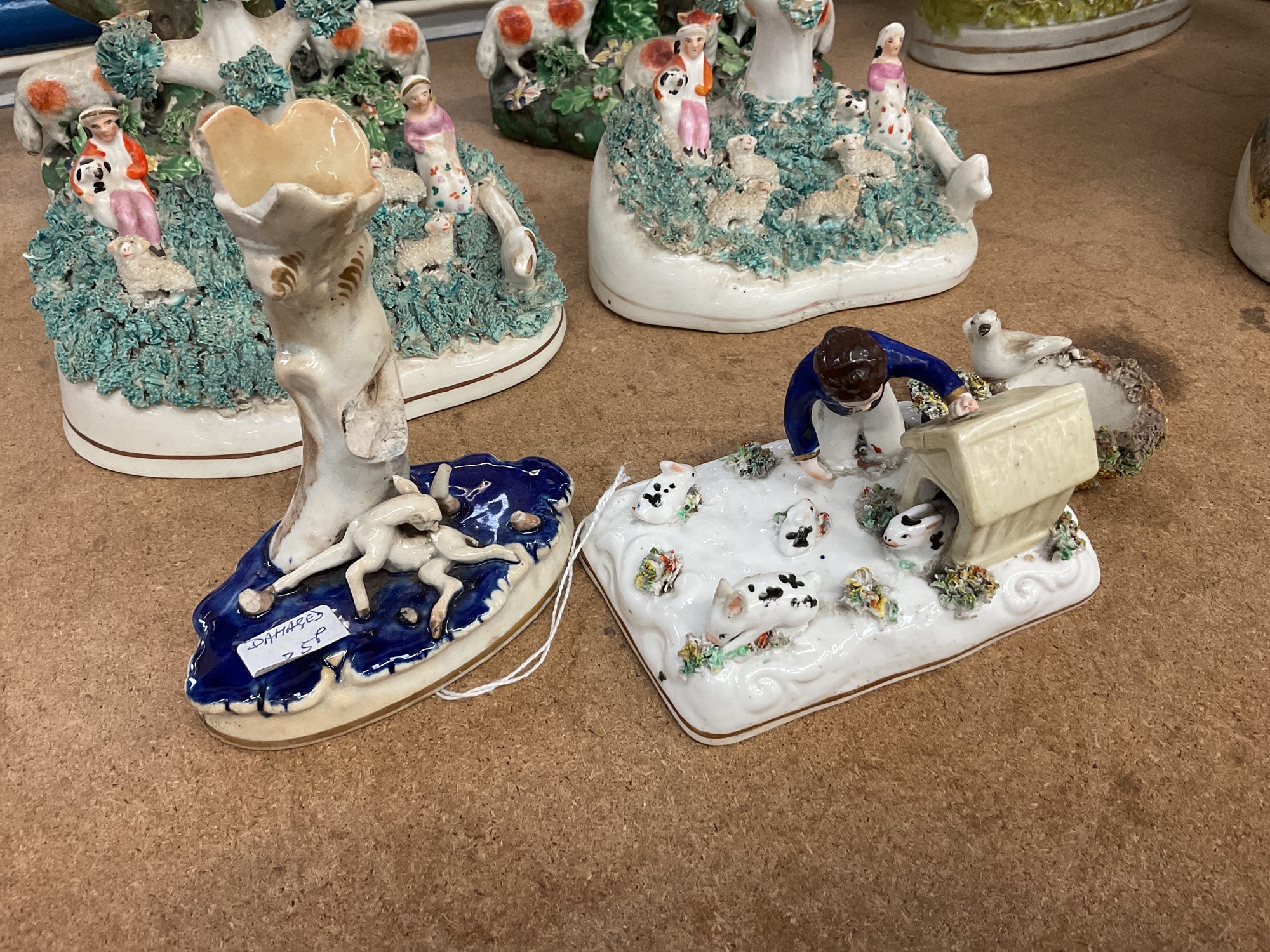 Lot 69 - Group of Staffordshire figures, including a