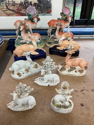 Lot 72 - Group of 19th century Staffordshire and Derby figures of stags and does, including a pair of spill vases, a pair of inkwells, etc