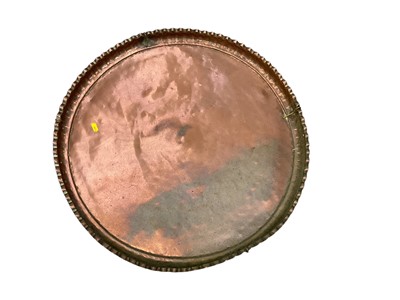 Lot 513 - Large Eastern beaten copper circular tray.