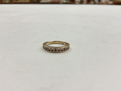 Lot 1161 - 9ct gold diamond half eternity ring