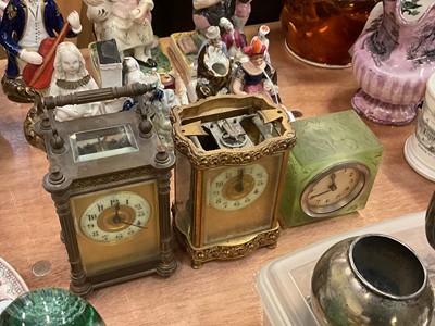 Lot 524 - Two carriage clocks together with an Art Deco frosted glass desk clock (3).