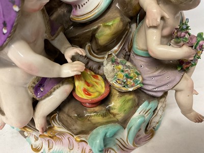 Lot 1 - Trio of late 19th century Meissen table centres, each mounted with cherubic figures