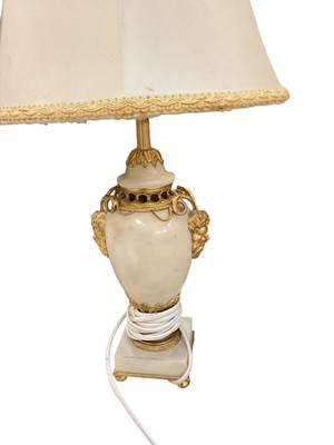 Lot 538 - Marble table lamp with gilt metal mounts.