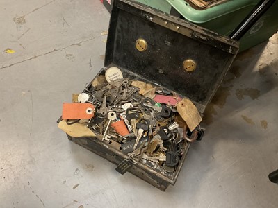 Lot 552 - Tin containing a quantity of assorted vintage car keys and other keys.