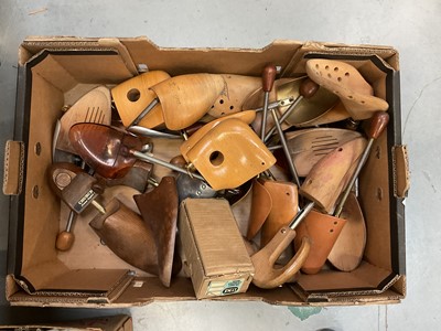 Lot 556 - Collection of wooden shoe trees in box.