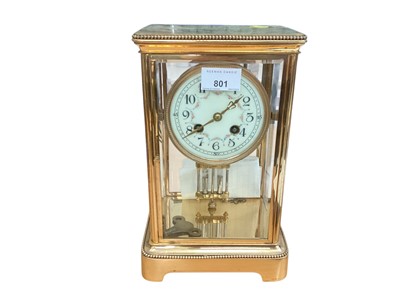 Lot 801 - Four glass mantel french clock