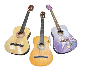 Lot 580 - Disney Hannah Montana guitar and two others (3).