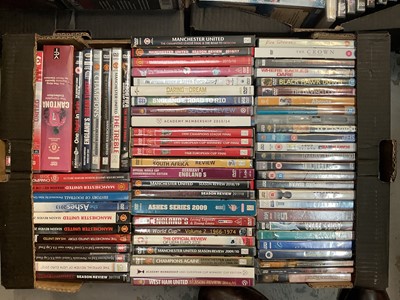 Lot 595 - Eight boxes of assorted DVD's and CD's (11).