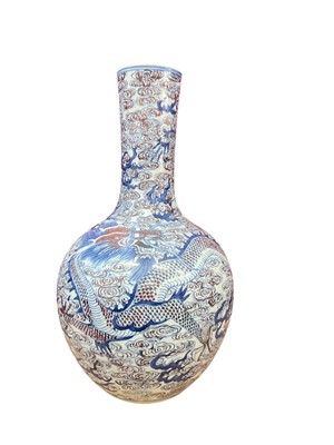 Lot 606 - Large Chinese porcelain vase with dragon decoration, approximately 47cm in overall height.